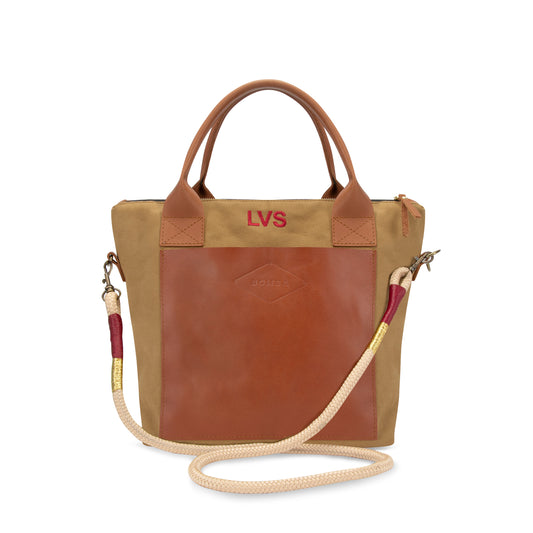 beige canvas and leather with embroidered initials
