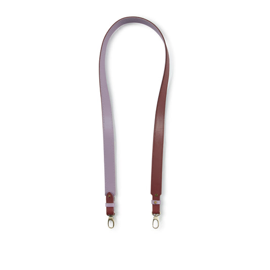 Lilac and burgundy: Reversible leather bag strap in lilac and burgundy with gold clip hooks, handmade in Cape Town